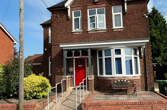 Regis House - An outside view of the home