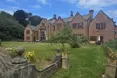 Caldy Manor - An outside view of the home