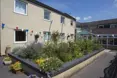 Camelot House & Lodge - Photo of the garden where applicable