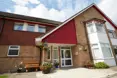 OSJCT Hartsholme House - An outside view of the home