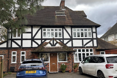 Tudor Lodge - An outside view of the home